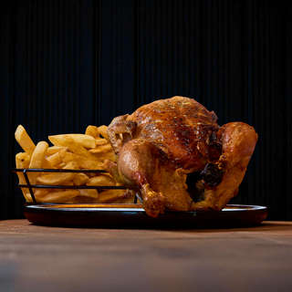 Producto Pollo Entero + Papas Fritas Grandes