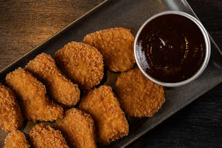 Producto Porción Nuggets