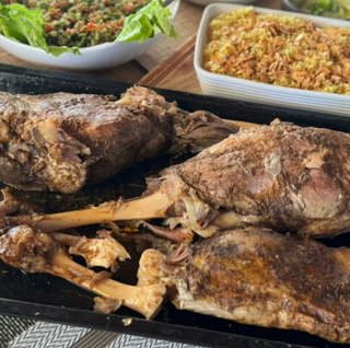 Producto Pierna de Cordero al Horno con 100 Hojas de parra