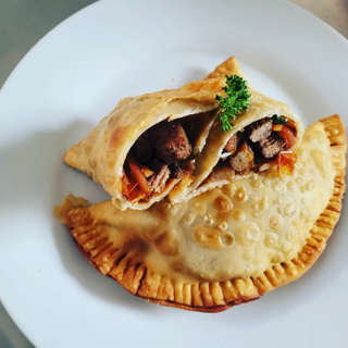 Producto empanada de lomo saltado